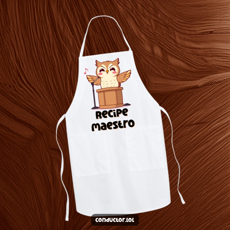 Funny Owl Conductor Apron showing a cheerful owl maestro conducting while cooking, bringing humor to the kitchen.