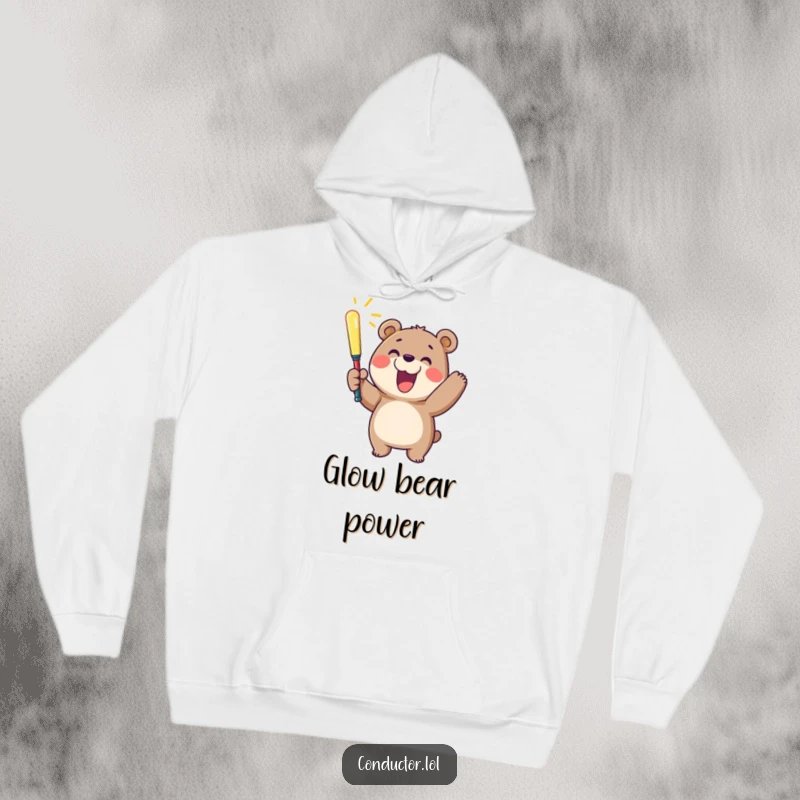 Funny hoodie with a cheerful bear enthusiastically waving a glowing baton and smiling wide, embodying pure happiness.