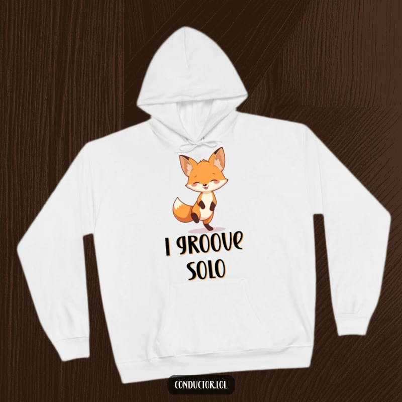 Funny fox tapping its foot to unheard music, full of playful energy, on a cozy hoodie, ideal for gifting.