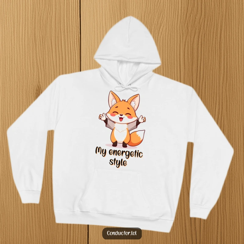 Funny and cozy hoodie depicting a happy fox enthusiastically waving its arms like a maestro, radiating pure delight and energy.