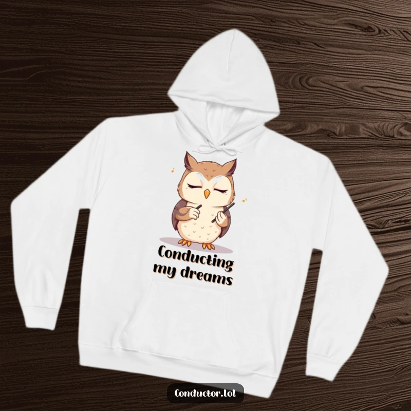 Funny owl conductor hoodie, eyes closed, conducting an unseen orchestra, providing cozy comfort and a touch of wise, humorous musicality.