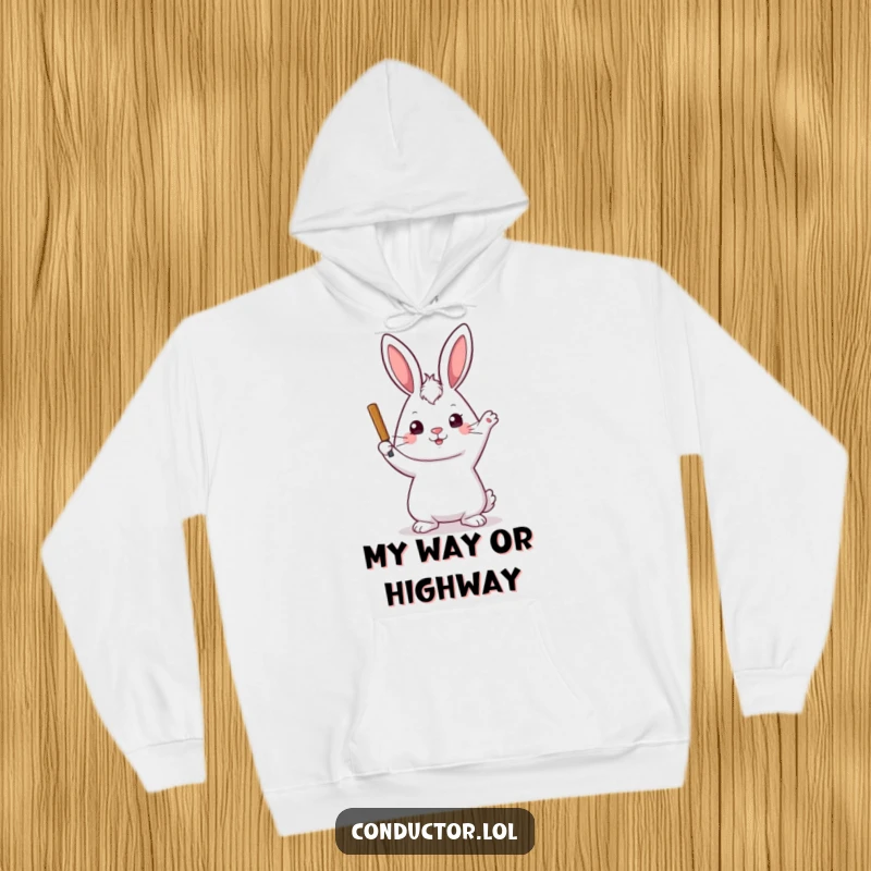 Funny and cozy hoodie depicting a playful rabbit with a stern yet kind expression, raising its baton with focused intent.