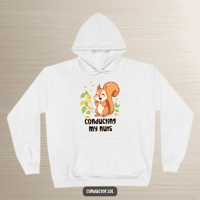 Funny cheerful squirrel energetically conducting a symphony of rustling leaves, on a warm hooded sweatshirt.