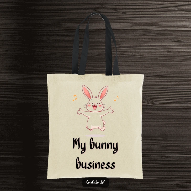 Funny Rabbit Conductor Tote Bag: A giggling rabbit leads an audience with joy, perfect for carrying musical essentials.